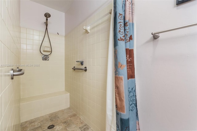 bathroom featuring walk in shower