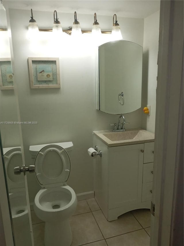 bathroom featuring vanity and tile patterned flooring