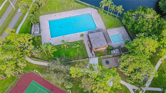 birds eye view of property featuring a water view