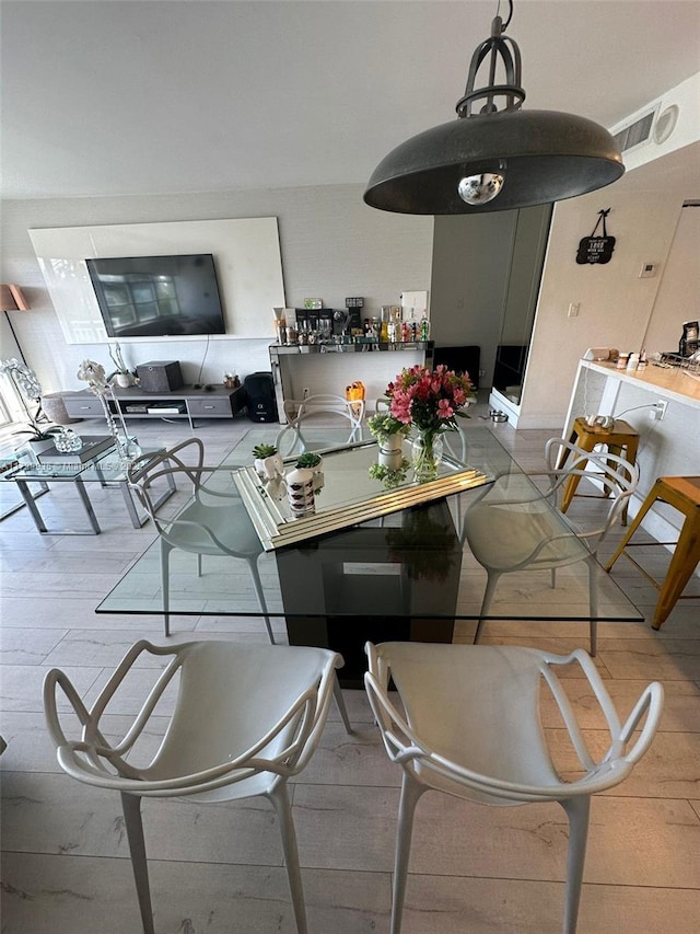 dining room featuring wood-type flooring