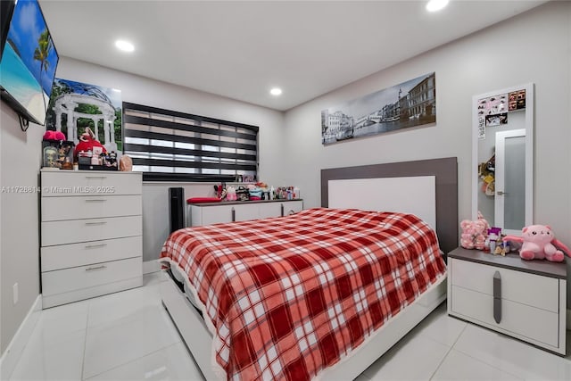 bedroom featuring light tile patterned floors