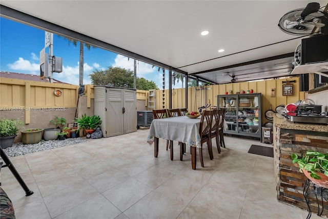 dining area featuring floor to ceiling windows and a healthy amount of sunlight