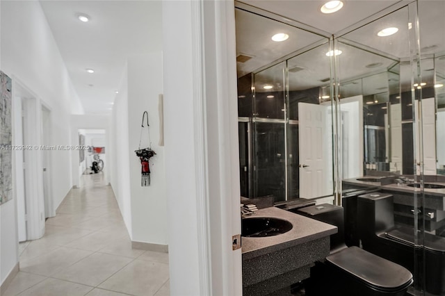 bathroom featuring vanity and tile patterned flooring