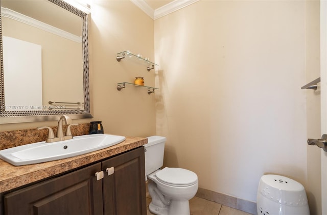 half bathroom with tile patterned flooring, toilet, vanity, baseboards, and ornamental molding