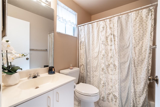 full bath with a shower with shower curtain, vanity, and toilet