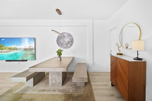 dining room featuring light hardwood / wood-style flooring