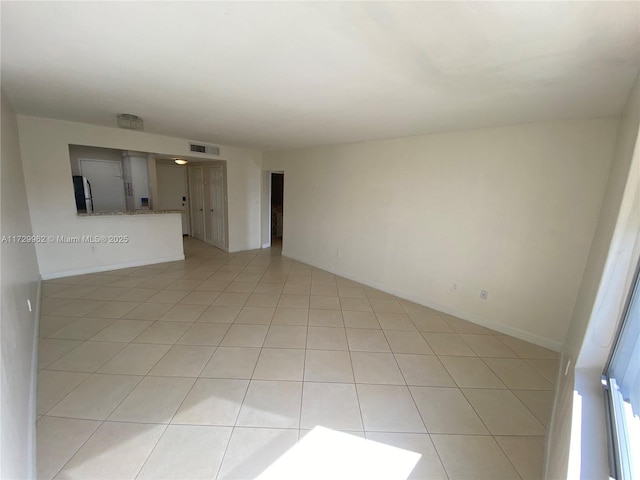 view of tiled spare room