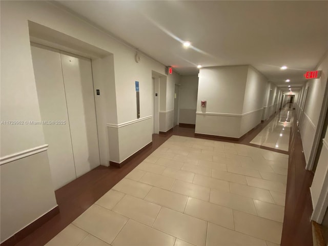 hall featuring tile patterned floors