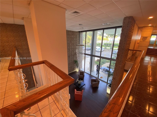 corridor with floor to ceiling windows