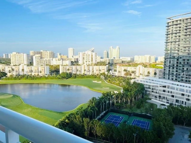 property view of water with view of golf course and a view of city