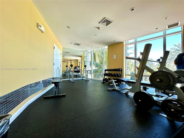 exercise room featuring visible vents
