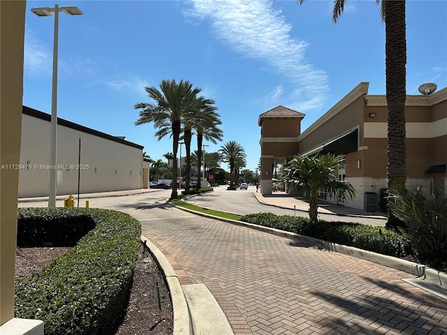 view of street featuring curbs