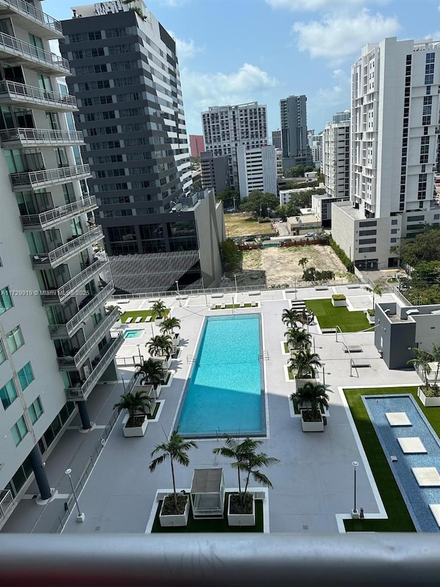 view of swimming pool featuring a patio