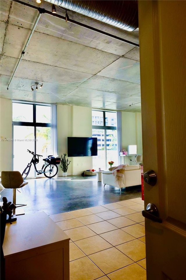 living room with floor to ceiling windows