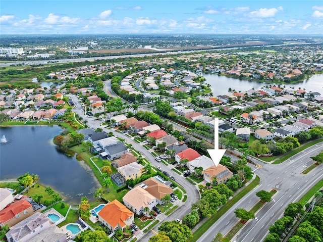 aerial view featuring a water view