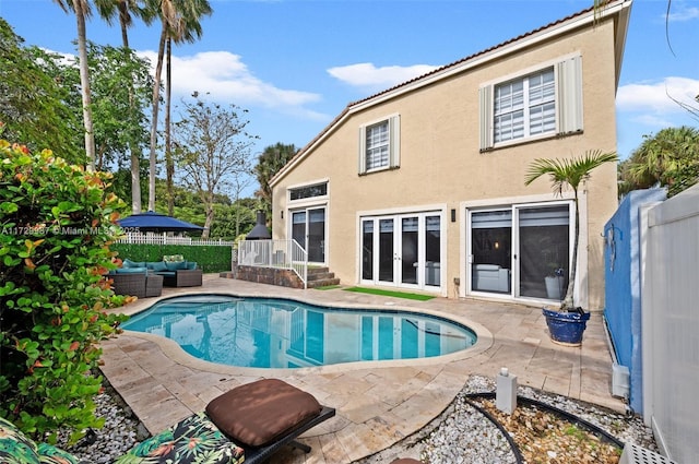 view of pool featuring outdoor lounge area and a patio area