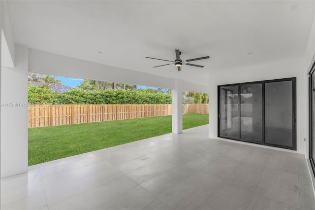 view of patio / terrace featuring ceiling fan