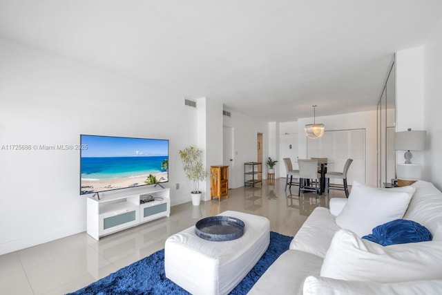 living room featuring light tile patterned floors