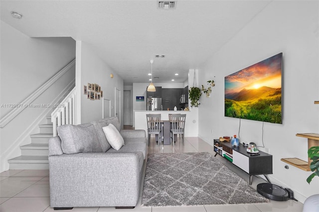 living room featuring tile patterned floors