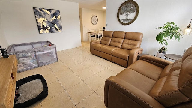 living area featuring tile patterned floors