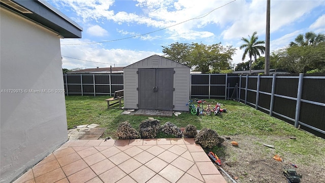 view of shed featuring a fenced backyard