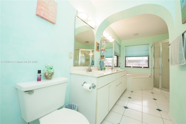 full bathroom featuring toilet, vanity, independent shower and bath, and tile patterned flooring