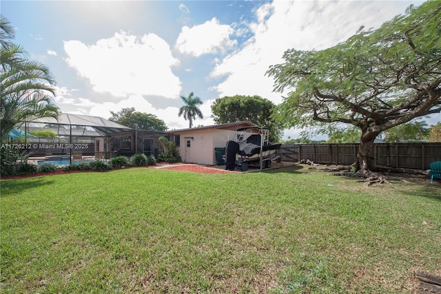 view of yard with a lanai