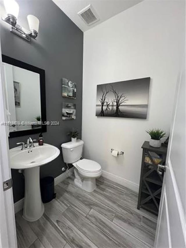 bathroom featuring toilet