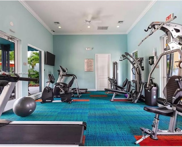 exercise room with ornamental molding