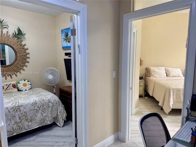 bedroom with light wood-type flooring