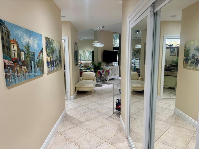 hallway with light tile patterned flooring