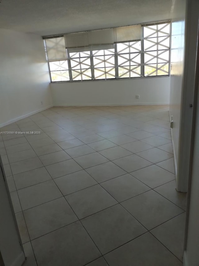 view of tiled spare room