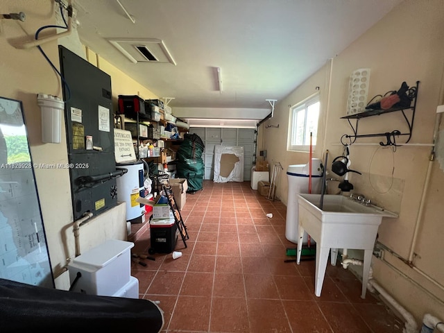 interior space with sink and tile patterned flooring