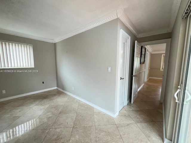 tiled empty room with crown molding