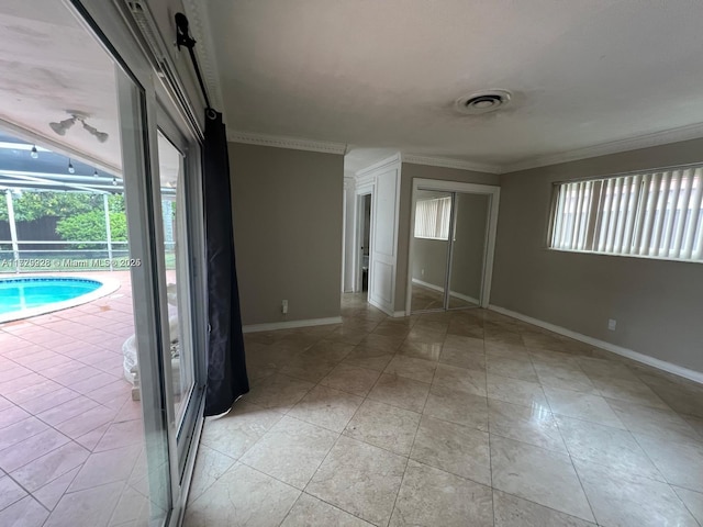 interior space with crown molding