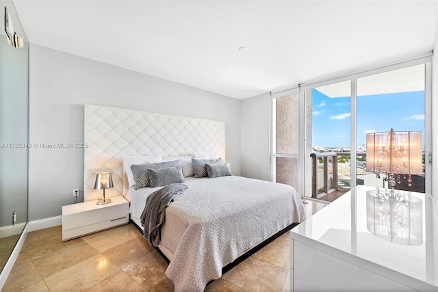 bedroom with floor to ceiling windows