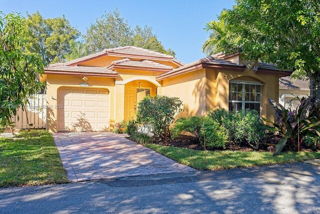 view of front of house with a garage