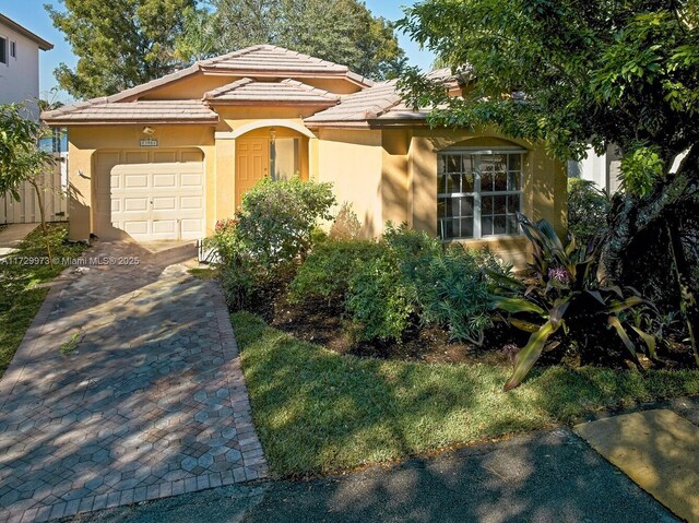 view of property exterior featuring a garage