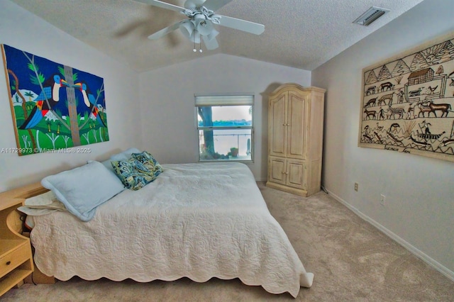 carpeted bedroom with lofted ceiling and ceiling fan