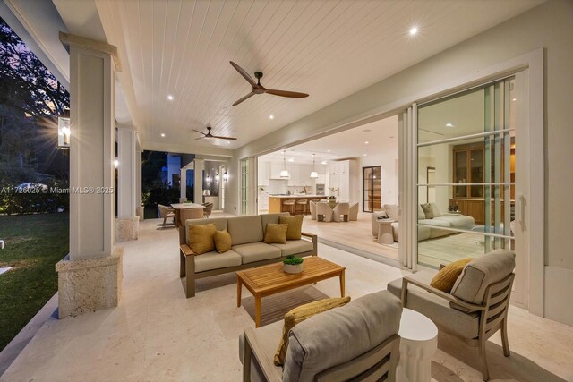 interior space featuring wood ceiling and ceiling fan