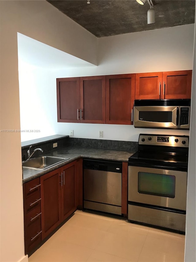 kitchen with sink and stainless steel appliances