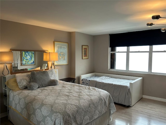 bedroom featuring light hardwood / wood-style floors