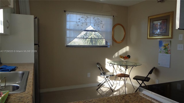 dining area featuring sink