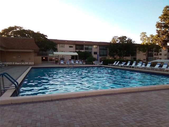 view of pool featuring a patio area