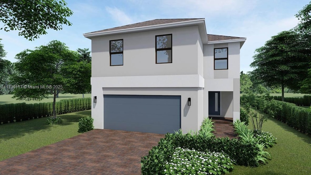 contemporary home featuring a garage and a front lawn