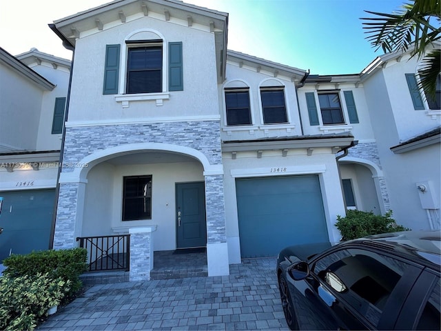 view of front of property with a garage