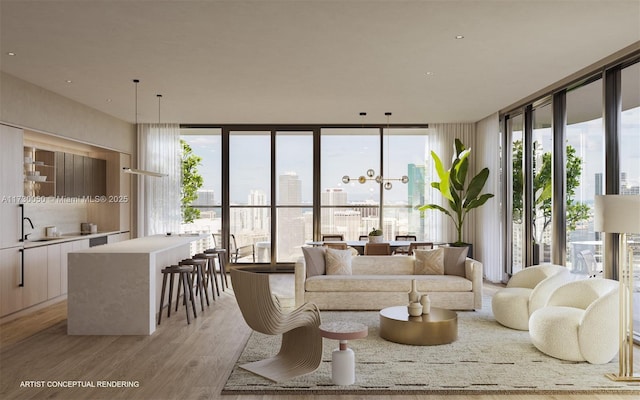 living room featuring sink, plenty of natural light, a wall of windows, and light hardwood / wood-style floors