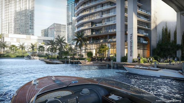 view of swimming pool with a water view