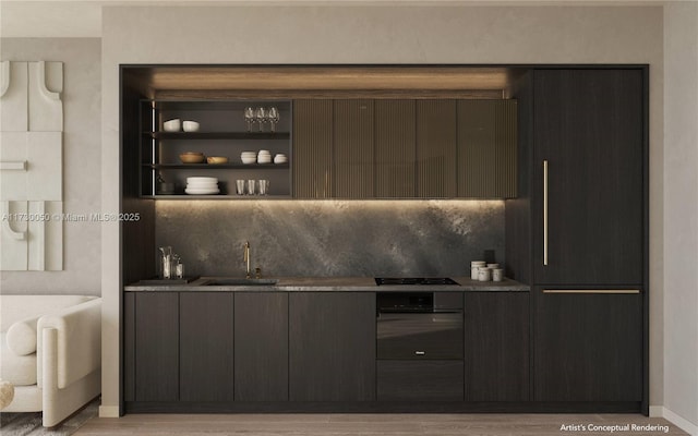 bar featuring sink, dark brown cabinetry, and black appliances