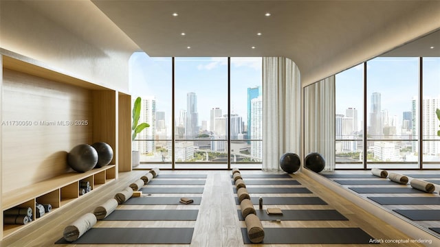 workout area with floor to ceiling windows